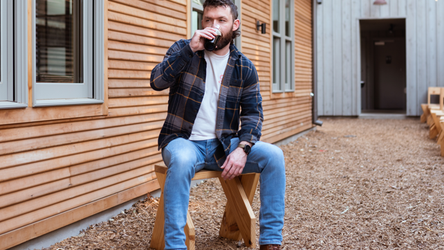 Kevin Lindsay sipping a beer in The Hollis