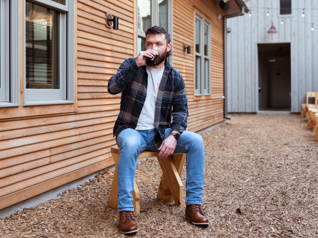 Kevin Lindsay sipping a beer in The Hollis